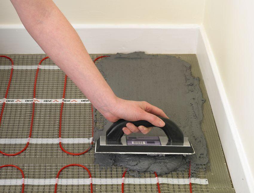 Above the electric mats, it is necessary to make a concrete screed with a thickness of 3 to 10 cm Above the electric mats, it is necessary to make a concrete screed with a thickness of 3 to 10 cm
