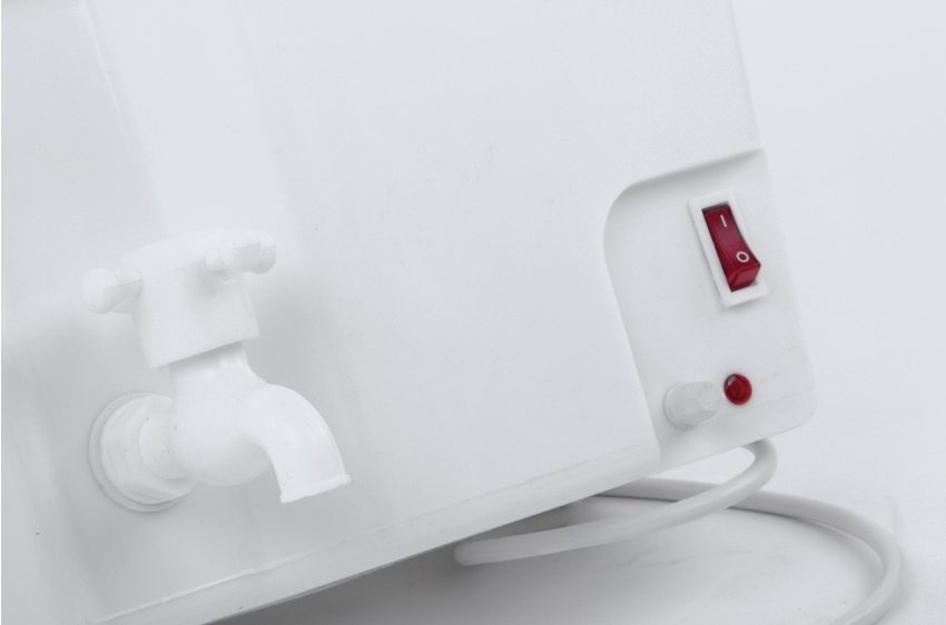 Plastic tank with a filling water heater tap for summer cottages Plastic tank with a filling water heater tap for summer cottages