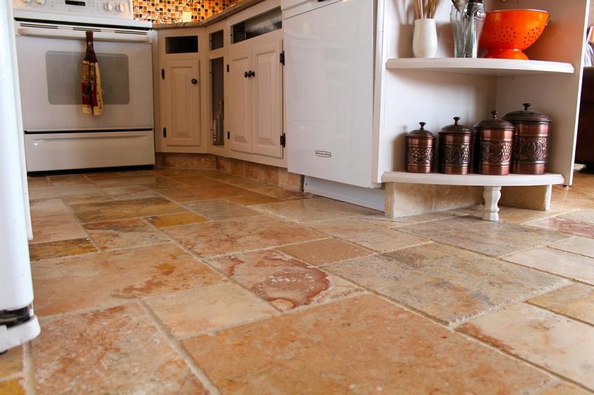 Natural stone is a durable material and works well for kitchen floors Natural stone is a durable material and works well for kitchen floors
