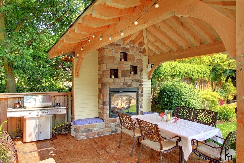 Gazebo with a stove, built of wood Gazebo with a stove, built of wood