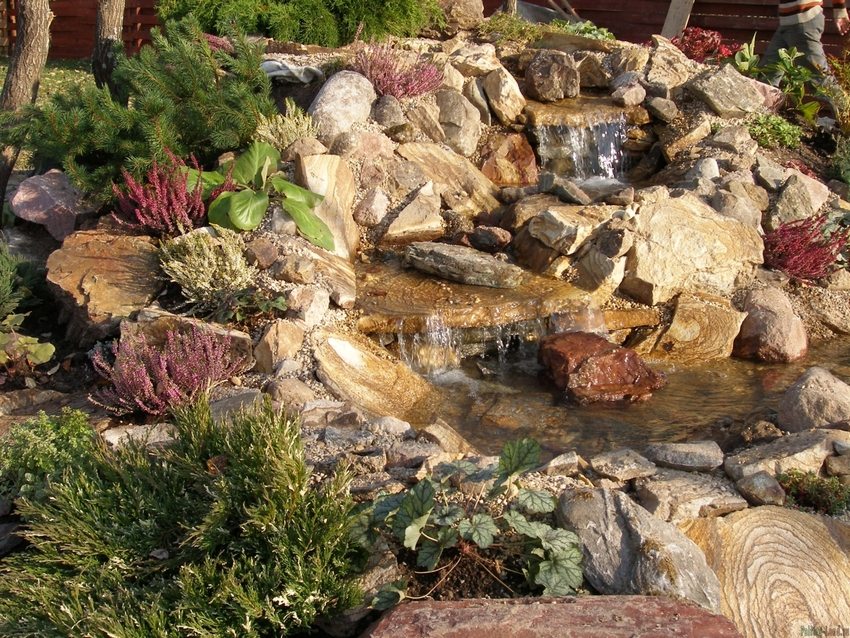 A picturesque composition, in the creation of which a combination of various types of stones was used A picturesque composition, in the creation of which a combination of various types of stones was used