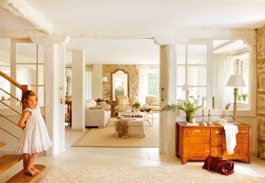 A partition separates the hall and the living room on the first floor of a private house A partition separates the hall and the living room on the first floor of a private house