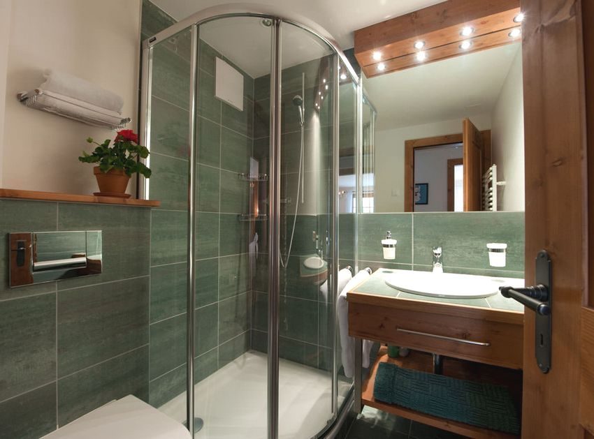 Small bathroom with installed shower Small bathroom with installed shower
