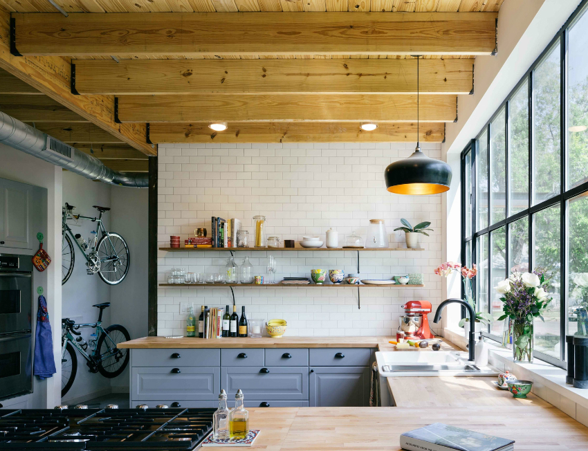 Panoramic windows look advantageous in loft apartments, emphasizing the style and design of the kitchen Panoramic windows look advantageous in loft apartments, emphasizing the style and design of the kitchen