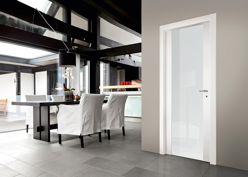 Glossy white doors look the most advantageous in the living room interior Glossy white doors look the most advantageous in the living room interior