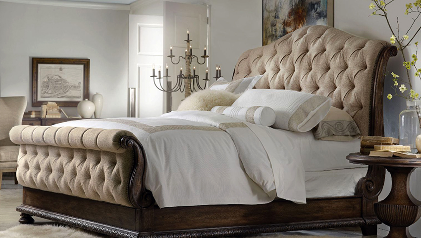 A bed with a soft headboard looks great in a bedroom with a classic design A bed with a soft headboard looks great in a bedroom with a classic design