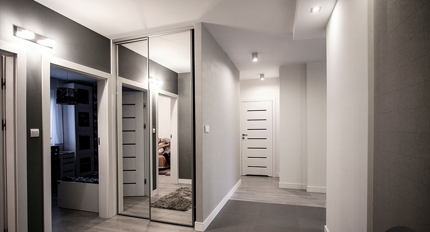 From where exactly in the hallway the wardrobe will stand, its size will depend From where exactly in the hallway the wardrobe will stand, its size will depend