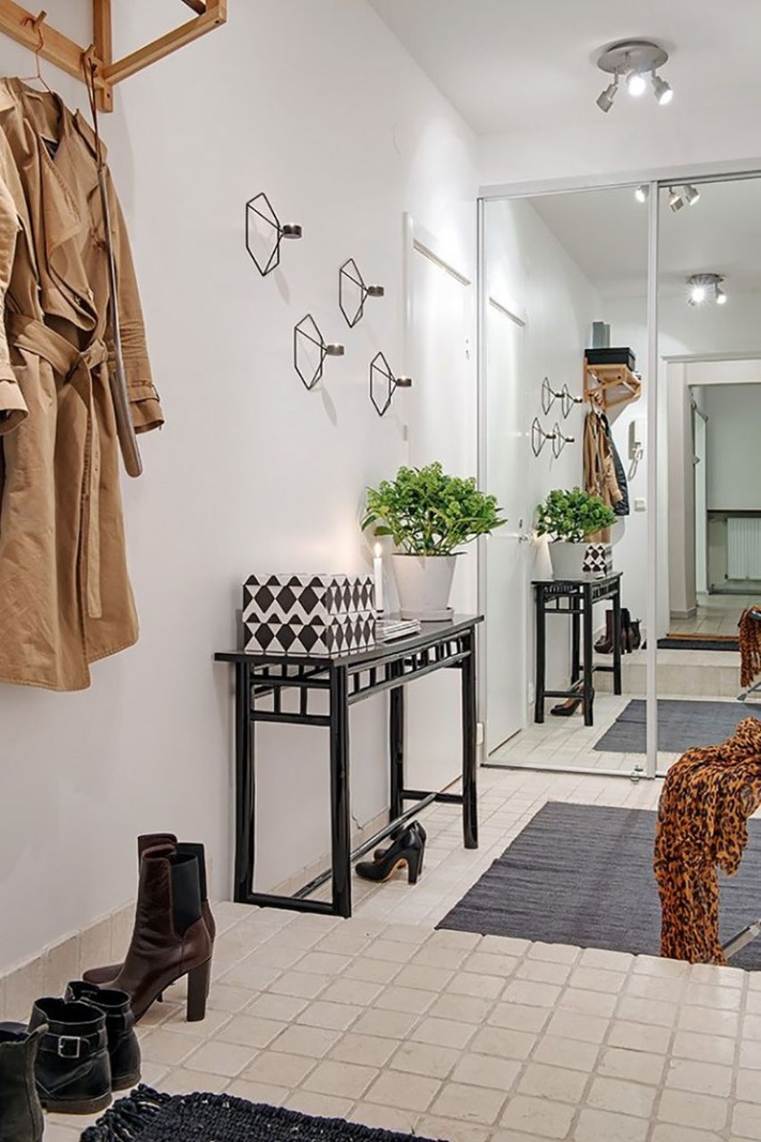 Mirrored doors installed in the wardrobe will expand the space, making the hallway noticeably larger Mirrored doors installed in the wardrobe will expand the space, making the hallway noticeably larger