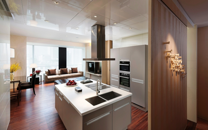 The interior of a high-tech kitchen looks very interesting without hanging cabinets The interior of a high-tech kitchen looks very interesting without hanging cabinets