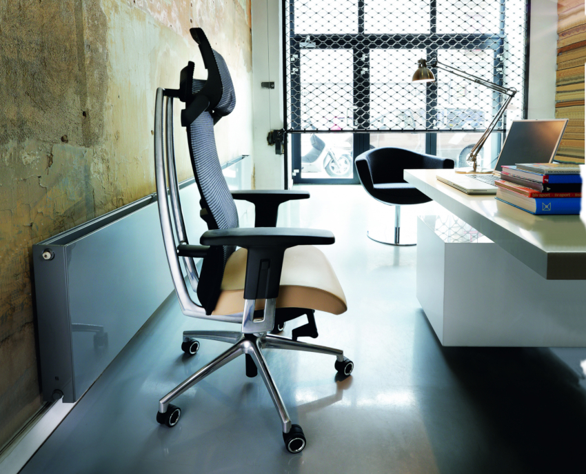 An orthopedic chair for working at a computer has the ability to adjust the height of the back and armrests, as well as change the angle of the back An orthopedic chair for working at a computer has the ability to adjust the height of the back and armrests, as well as change the angle of the back