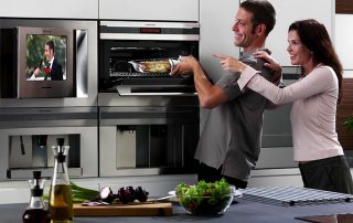 TV in the kitchen: how to choose and install it in the room