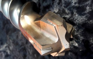 Drill for a hammer drill: the choice of an impact-cutting nozzle, its purpose